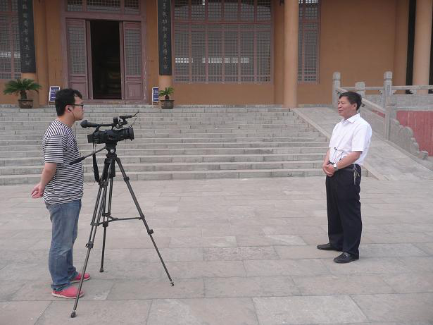 中新社记者采访会长张宏江（文化资料）.png